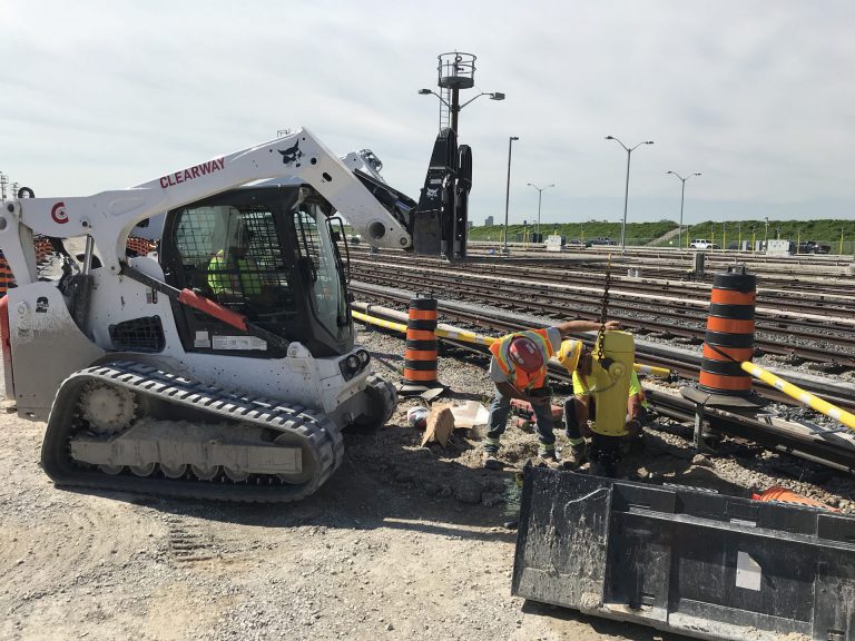 Clearway construction machine and worker on site