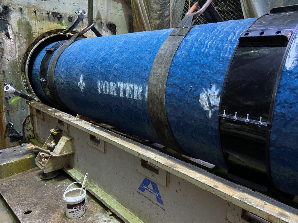Blue Forterra pipe being installed