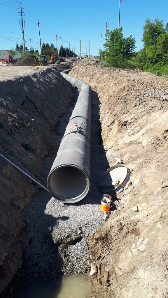 concrete pipeline going underground